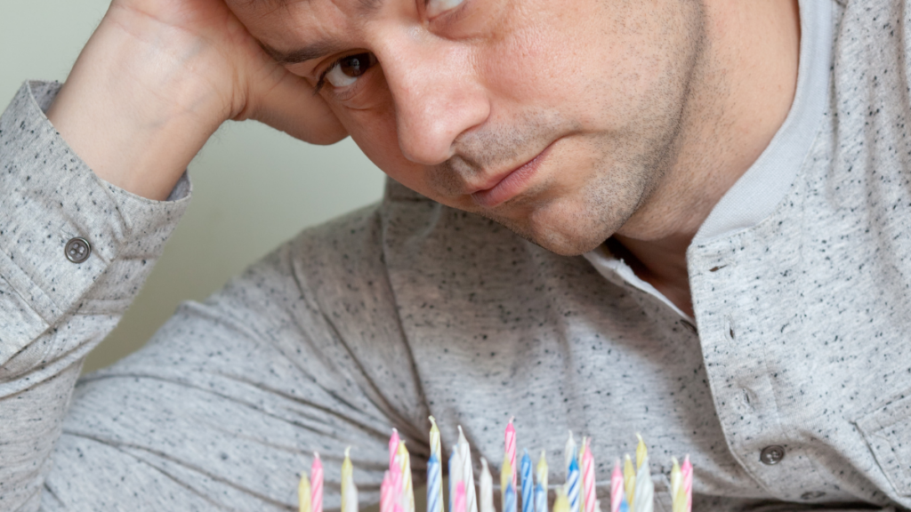 man with birthday cake