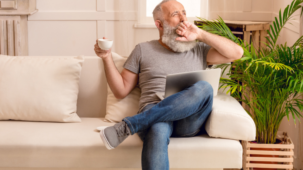 Man Yawning Sitting