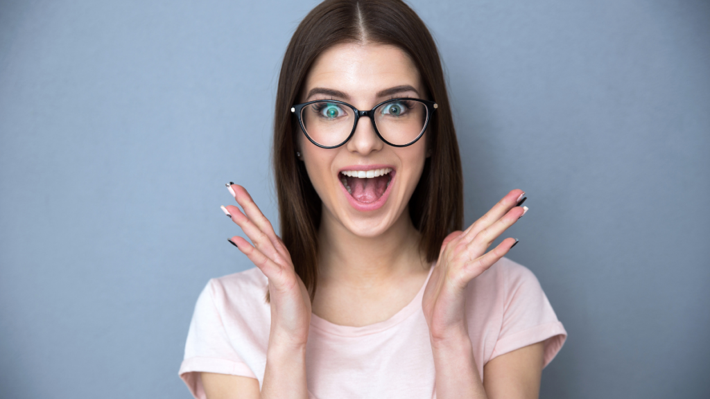 Surprised woman in glasses