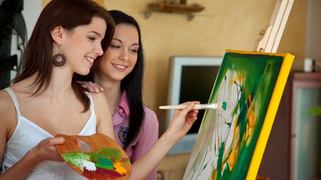 two women painting