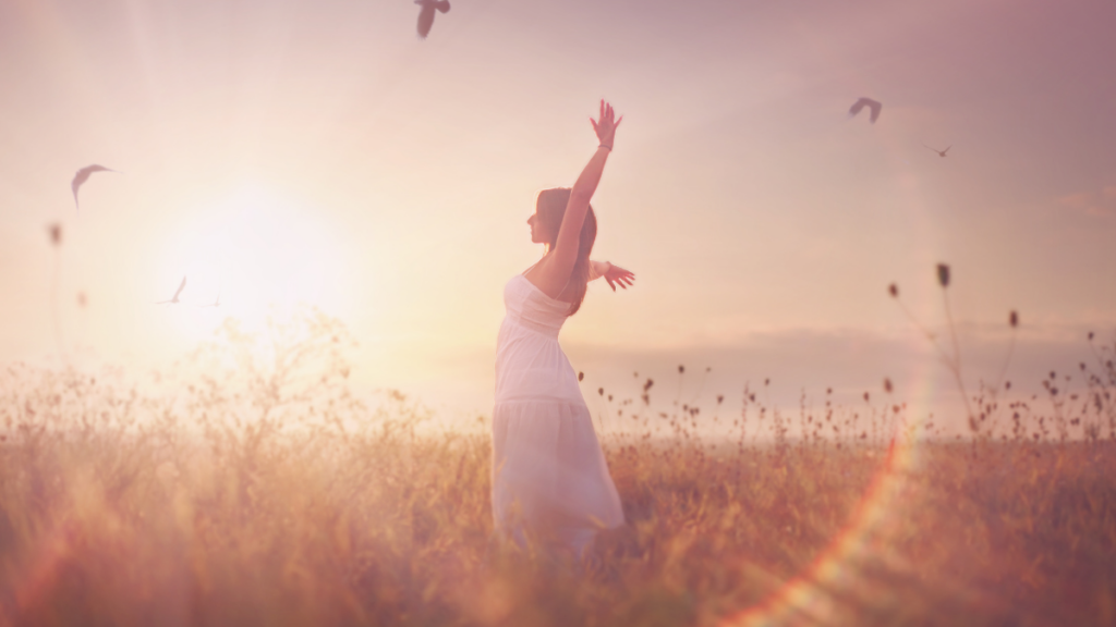 Woman happy in meadow