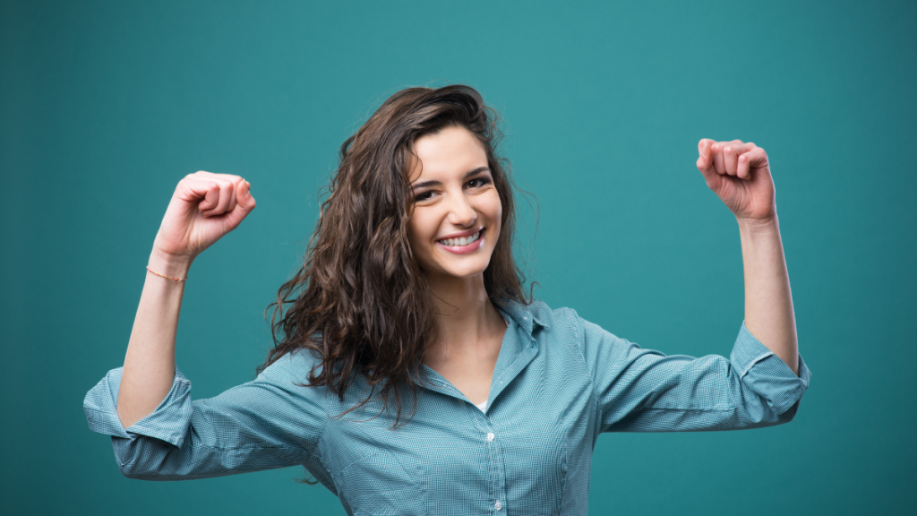 woman making muscles